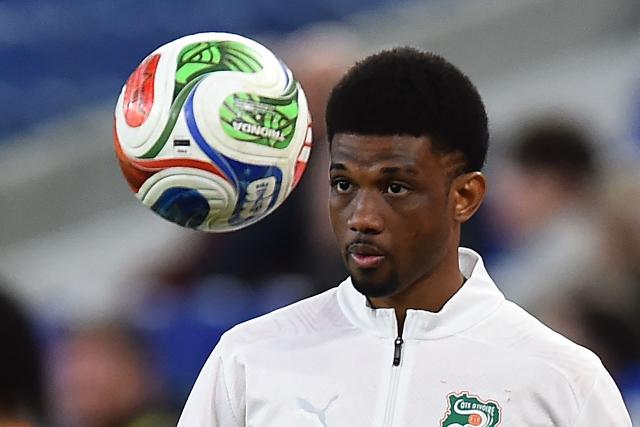 Ivory Coast's forward #15 Amad Diallo warms up during the friendly international football match between Scotland and Ivory Coast at the Hill Dickinson Stadium in Liverpool, north west England on March 31, 2026.  (Photo by PETER POWELL / AFP)