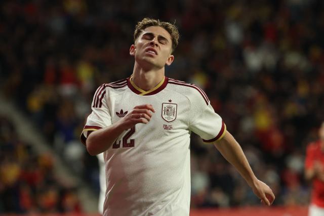 Spain's forward #22 Fermin Lopez reacts after missing a chance to score during the international friendly football match between Spain and Egypt at RCDE Stadium in Cornella de Llobregat, near Barcelona, on March 31, 2026. (Photo by Lluis GENE / AFP)