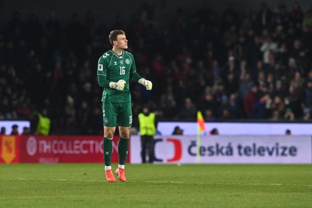 Czech Republic's goalkeeper #16 Lukas Hornicek celebrates after his team scored the equalizing goal 1-1 during the FIFA World Cup 2026 European qualification final football match Czech Republic vs Denmark on March 31, 2026 in Prague, Czech Republic. (Photo by Michal Cizek / AFP)