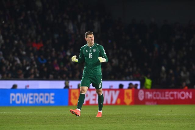 Czech Republic's goalkeeper #16 Lukas Hornicek celebrates after his team scored the equalizing goal 1-1 during the FIFA World Cup 2026 European qualification final football match Czech Republic vs Denmark on March 31, 2026 in Prague, Czech Republic. (Photo by Michal Cizek / AFP)