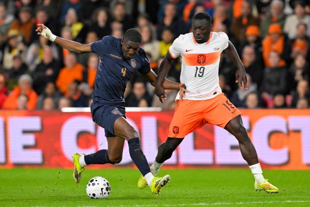 Ecuador's Defender #04 Joel Ordonez (L) fights for the ball with Netherlands' forward #19 Brian Brobbey (R) during the friendly international football match between the Netherlands and Ecuador at the PSV Stadium in Eindhoven on March 31, 2026. (Photo by JOHN THYS / AFP)
