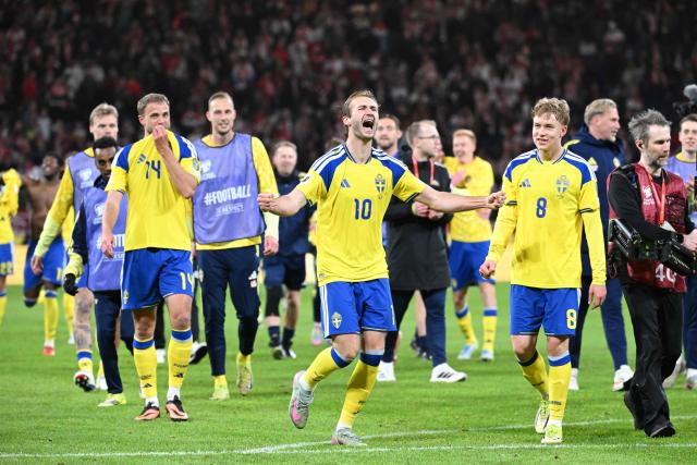 Sweden's players celebrate after winning 3:2 the FIFA World Cup 2026 European qualification final football match between Sweden and Poland in Solna, Sweden, on March 31, 2026. (Photo by Jonathan Nackstrand / AFP)