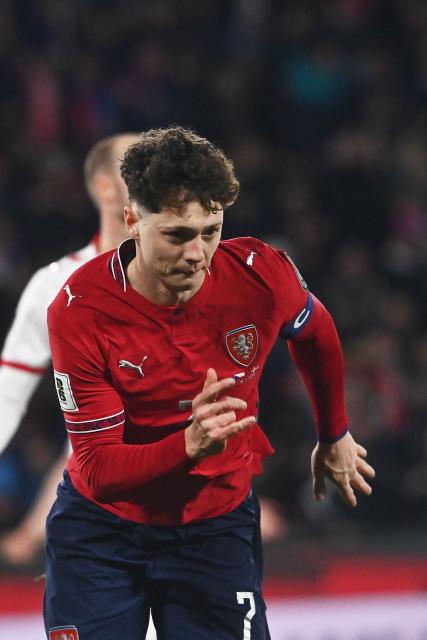 Czech Republic's defender #07 Ladislav Krejci reacts after scoring the 2-1 goal during the first period of extra time during the FIFA World Cup 2026 European qualification final football match Czech Republic vs Denmark on March 31, 2026 in Prague, Czech Republic. (Photo by Michal Cizek / AFP)