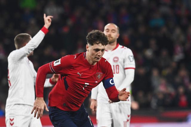 Czech Republic's defender #07 Ladislav Krejci reacts after scoring the 2-1 goal during the first period of extra time during the FIFA World Cup 2026 European qualification final football match Czech Republic vs Denmark on March 31, 2026 in Prague, Czech Republic. (Photo by Michal Cizek / AFP)
