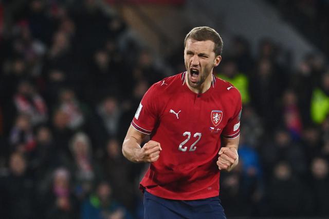 Czech Republic's midfielder #22 Tomas Soucek celebrates after scoring during the penalty shoot-outs during the FIFA World Cup 2026 European qualification final football match Czech Republic vs Denmark on March 31, 2026 in Prague, Czech Republic. (Photo by Michal Cizek / AFP)