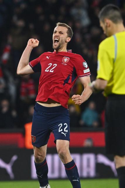 Czech Republic's midfielder #22 Tomas Soucek celebrates after scoring during the penalty shoot-outs during the FIFA World Cup 2026 European qualification final football match Czech Republic vs Denmark on March 31, 2026 in Prague, Czech Republic. (Photo by Michal Cizek / AFP)