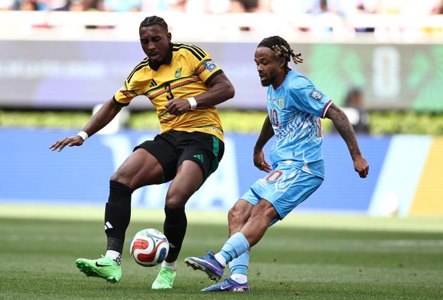 Jamaica's defender #03 Amari'i Bell and DR Congo's midfielder #10 Theo Bongonda fight for the ball during the 2026 FIFA World Cup qualifiers final playoff football match between the Democratic Republic of the Congo and Jamaica at the Akron Stadium in Zapopan, Jalisco state, Mexico, on March 31, 2026. (Photo by Ulises Ruiz / AFP)