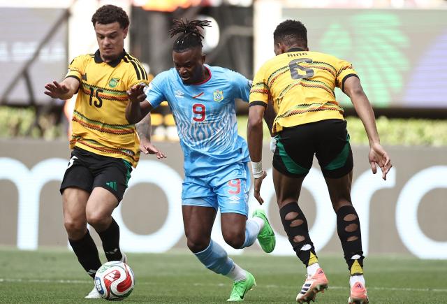 DR Congo's midfielder #09 Brian Cipenga (C) fights for the ball with Jamaica's defender #15 Joel Latibeaudiere and defender #06 Richard King during the 2026 FIFA World Cup qualifiers final playoff football match between the Democratic Republic of the Congo and Jamaica at the Akron Stadium in Zapopan, Jalisco state, Mexico, on March 31, 2026. (Photo by Ulises Ruiz / AFP)