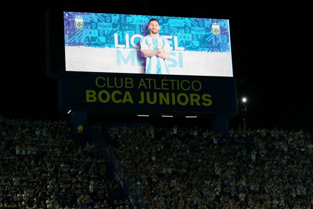 A screen shows Argentina's forward #10 Lionel Messi ahead of a friendly football match between Argentina and Zambia at La Bombonera stadium in Buenos Aires on March 31, 2026. (Photo by JUAN MABROMATA / AFP)