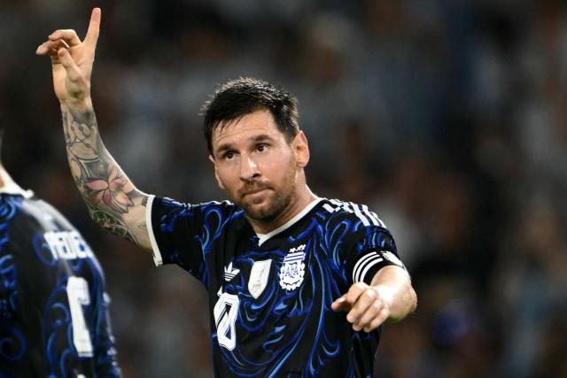 Argentina's forward #10 Lionel Messi celebrates scoring his team's second goal during a friendly football match between Argentina and Zambia at La Bombonera stadium in Buenos Aires on March 31, 2026. (Photo by Luis ROBAYO / AFP)