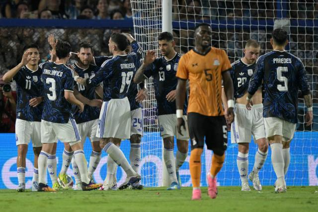 Argentina's forward #10 Lionel Messi (C) celebrates with teammates after scoring his team's second goal during a friendly football match between Argentina and Zambia at La Bombonera stadium in Buenos Aires on March 31, 2026. (Photo by JUAN MABROMATA / AFP)