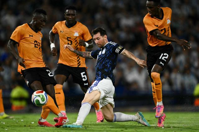 (L-R) Zambia's defender #21 Dominic Chanda, defender #05 Tinkler Sinkala, Argentina's forward #10 Lionel Messi, and Zambia's midfielder #12 Wilson Chisala fight for the ball during a friendly football match between Argentina and Zambia at La Bombonera stadium in Buenos Aires on March 31, 2026. (Photo by Luis ROBAYO / AFP)