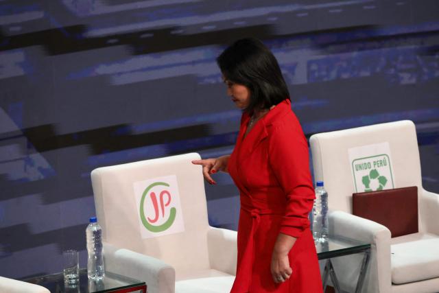 Peru's presidential candidate Keiko Fujimori, for the Fuerza Popular party gestures during the second round of debates on education and employment at the Lima Convention Center in Lima on March 31, 2026. Peru will hold presidential elections on April 12. (Photo by Connie FRANCE / AFP)