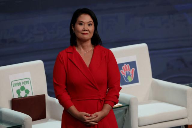 Peru's presidential candidate Keiko Fujimori, for the Fuerza Popular party looks on during the second round of debates on education and employment at the Lima Convention Center in Lima on March 31, 2026. Peru will hold presidential elections on April 12. (Photo by Connie FRANCE / AFP)