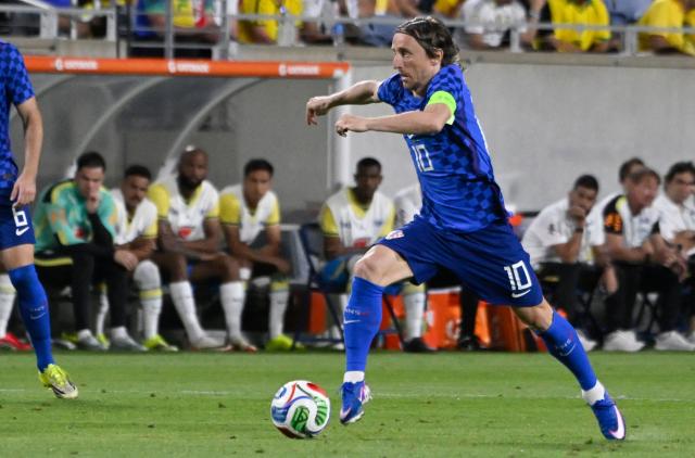 Croatia's midfielder #10 Luka Modric controls the ball during a friendly football match between Brazil and Croatia at Camping World Stadium in Orlando, Florida, on March 31, 2026. (Photo by MIGUEL J RODRIGUEZ CARRILLO / AFP)
