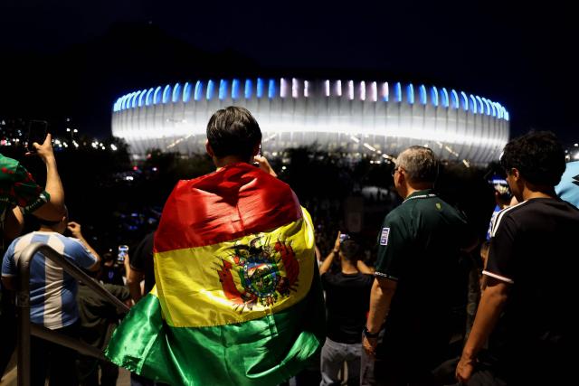 Bolivian fans arrive to the 2026 FIFA World Cup qualifiers final playoff football match between Iraq and Bolivia at the BBVA Stadium in Guadalupe, Nuevo Leon state, Mexico, on March 31, 2026. (Photo by Julio Cesar AGUILAR / AFP)