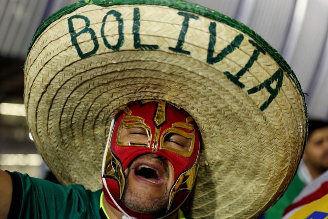 A Bolivian fan cheers for his team ahead of the 2026 FIFA World Cup qualifiers final playoff football match between Iraq and Bolivia at the BBVA Stadium in Guadalupe, Nuevo Leon state, Mexico, on March 31, 2026. (Photo by Julio Cesar AGUILAR / AFP)