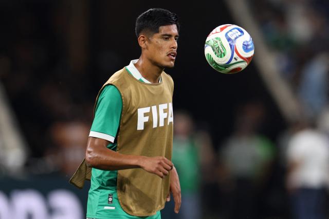 Bolivia's forward #11 Fernando Nava looks at the ball as he warms up ahead of the 2026 FIFA World Cup qualifiers final playoff football match between Iraq and Bolivia at the BBVA Stadium in Guadalupe, Nuevo Leon state, Mexico, on March 31, 2026. (Photo by Julio Cesar AGUILAR / AFP)