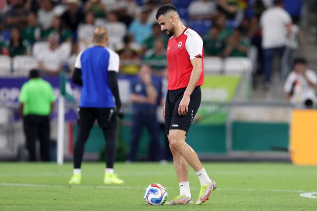 Iraq's forward #18 Aymen Hussein warms up ahead of the 2026 FIFA World Cup qualifiers final playoff football match between Iraq and Bolivia at the BBVA Stadium in Guadalupe, Nuevo Leon state, Mexico, on March 31, 2026. (Photo by Julio Cesar AGUILAR / AFP)
