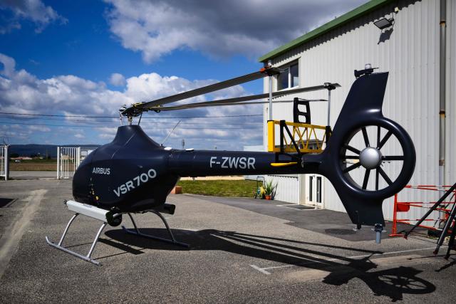This photograph shows an Airbus VSR700 uncrewed aerial system (UAS) helicopter drone at the Survey Copter factory, an Airbus subsidiary in Pierrelatte, southern France on March 31, 2026. At Survey Copter, a French SME integrated into Airbus, the European aerospace corporation is leaning on its know-how in helicopters to develop drones — which have become the sinews of modern warfare — and to make them cooperate with manned aircraft. (Photo by OLIVIER CHASSIGNOLE / AFP)
