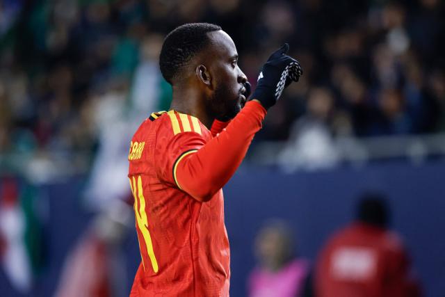 Belgium's forward #14 Dodi Lukebakio celebrates after scoring a goal during a friendly football match between Mexico and Belgium at Soldier Field in Chicago, Illinois, on March 31, 2026. (Photo by KAMIL KRZACZYNSKI / AFP)