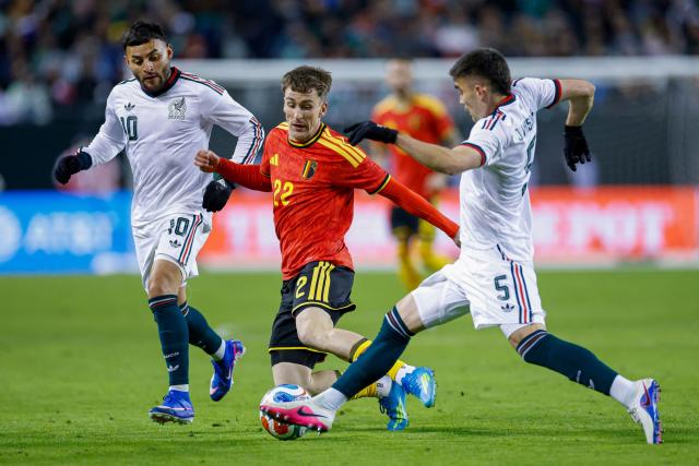 Belgium's forward #22 Alexis Saelemaekers (C) is challenged by Mexico's defender #05 Johan Vasquez and Mexico's forward #10 Alexis Vega during a friendly football match between Mexico and Belgium at Soldier Field in Chicago, Illinois, on March 31, 2026. (Photo by KAMIL KRZACZYNSKI / AFP)