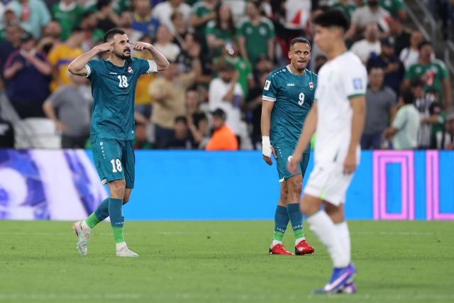 Iraq's forward #18 Aymen Hussein celebrates scoring his team's second goal during the 2026 FIFA World Cup qualifiers final playoff football match between Iraq and Bolivia at the BBVA Stadium in Guadalupe, Nuevo Leon state, Mexico, on March 31, 2026. (Photo by Julio Cesar AGUILAR / AFP)