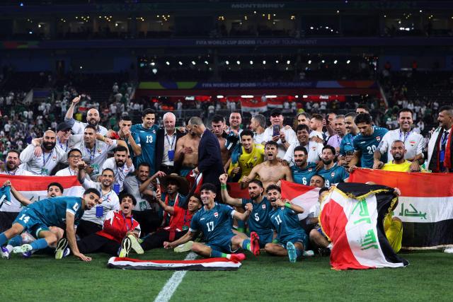 TOPSHOT - Iraq's players celebrate after winning the 2026 FIFA World Cup qualifiers final playoff football match between Iraq and Bolivia at the BBVA Stadium in Guadalupe, Nuevo Leon state, Mexico, on March 31, 2026. (Photo by Julio Cesar AGUILAR / AFP)