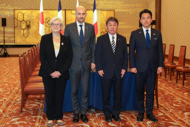 (L to R) Catherine Vautrin, French Minister for the Armed Forces and Veterans Affairs of the France, Jean-Noel Barrot, French Minister for Europe and Foreign Affairs, pose with Motegi Toshimitsu, Japanese Minister for Foreign Affairs, and Koizumi Shinjiro, Japanese Defence Minister, prior to their meeting at Iikura Guest House in Tokyo on April 1, 2026. (Photo by Rodrigo Reyes Marin / POOL / AFP)