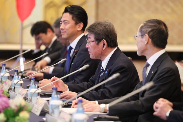Motegi Toshimitsu, Japanese Minister for Foreign Affairs, and Koizumi Shinjiro, Japanese Defence Minister, attend a meeting with Jean-Noel Barrot, French Minister for Europe and Foreign Affairs and Catherine Vautrin, French Minister for the Armed Forces and Veterans Affairs (not in picture) at Iikura Guest House in Tokyo on April 1, 2026. (Photo by Rodrigo Reyes Marin / POOL / AFP)