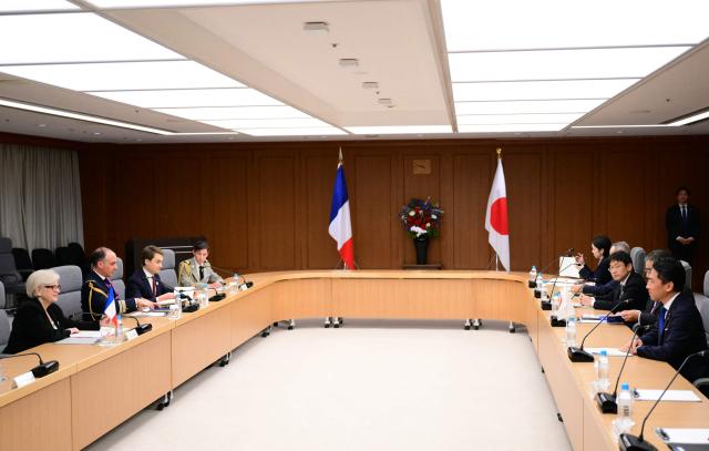 France's Defence Minister Catherine Vautrin (L) attends a meeting with Japan's Defence Minister Shinjiro Koizumi (R) at the Defence Ministry in Tokyo on April 1, 2026. (Photo by Yuichi YAMAZAKI / AFP)
