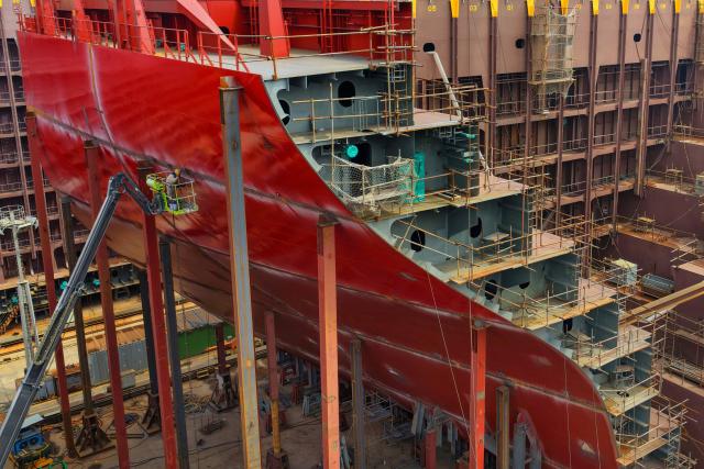A general view shows the construction of a vessel at Nantong Huateng Intelligent Equipment Manufacturing Co., Ltd. in the Tongzhou Bay High-end Equipment Port Industrial Park in Nantong, in China's eastern Jiangsu province on March 31, 2026. (Photo by CN-STR / AFP) / China OUT