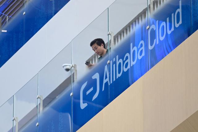 Alibaba Cloud signage is pictured during a tour at the Alibaba office in Beijing on April 1, 2026. (Photo by WANG Zhao / AFP)
