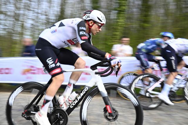 Belgium's cyclist Rune Herregodts of UAE Team Emirates-XRG competes in the men's elite race of the Dwars door Vlaanderen - A travers la Flandre cycling race, 184.6km from Roeselare to Waregem, in Waregem on April 1, 2026. (Photo by JASPER JACOBS / Belga / AFP) / Belgium OUT