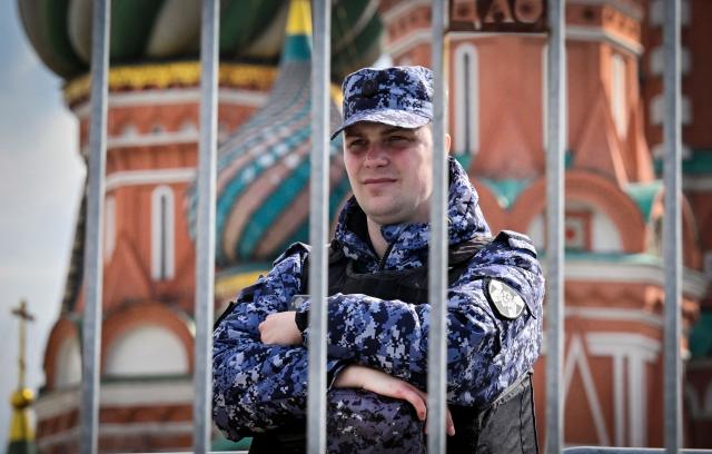 A Russian National Guard (Rosgvardia) serviceman stands guard on Red Square in front of St. Basil's Cathedral in central Moscow on April 1, 2026. (Photo by Alexander NEMENOV / AFP)