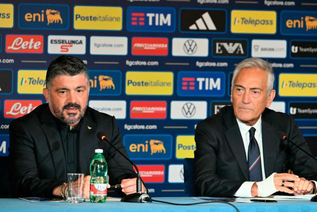 (FILES) Italy's national football team headcoach Gennaro Gattuso (L) speaks next to the president of the Italian Football Federation Gabriele Gravina during a press conference in Rome on June 19, 2025. Italy's Sport Minister Andrea Abodi said on April 1, 2026 the head of the country's football federation should step down after the national team failed to qualify for a third consecutive World Cup. The Azzurri fell at the play-offs again, this time after a penalty shoot-out against Bosnia and Hercegovina on March 31, and will miss this summer's finals in the United States, Canada and Mexico. (Photo by Alberto PIZZOLI / AFP)