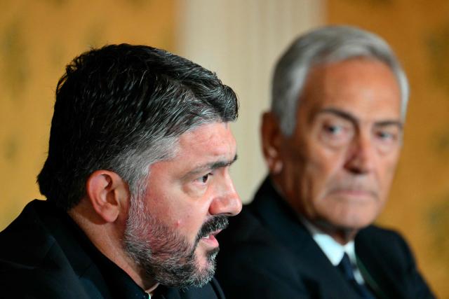 (FILES) Italy's national football team headcoach Gennaro Gattuso (L) speaks next to the president of the Italian Football Federation Gabriele Gravina during a press conference in Rome on June 19, 2025. Italy's Sport Minister Andrea Abodi said on April 1, 2026 the head of the country's football federation should step down after the national team failed to qualify for a third consecutive World Cup. The Azzurri fell at the play-offs again, this time after a penalty shoot-out against Bosnia and Hercegovina on March 31, and will miss this summer's finals in the United States, Canada and Mexico. (Photo by Alberto PIZZOLI / AFP)