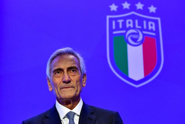 (FILES) New President of the Italian Football Federation (FIGC), Gabriele Gravina poses with the federation's logo following the vote during the elective assembly of the FIGC on October 22, 2018 at the Hilton hotel of Rome's Fiumicino airport. Italy's Sport Minister Andrea Abodi said on April 1, 2026 the head of the country's football federation should step down after the national team failed to qualify for a third consecutive World Cup. The Azzurri fell at the play-offs again, this time after a penalty shoot-out against Bosnia and Hercegovina on March 31, and will miss this summer's finals in the United States, Canada and Mexico. (Photo by Alberto PIZZOLI / AFP)