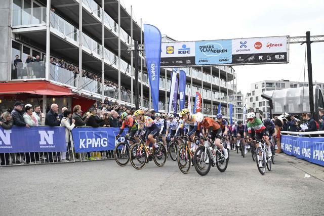 Netherlands' Mick Van Dijke of Red Bull-BORA-hansgrohe (3rd L), France's Thibaud Gruel of Groupama-FDJ United ) and Norway's Jonas Abrahamsen of Uno-X Mobility (R) compete during the men's elite race of the Dwars door Vlaanderen cycling event, 128,9km from Roeselare to Waregem, on April 1, 2026. (Photo by Tom Goyvaerts / Belga / AFP) / Belgium OUT