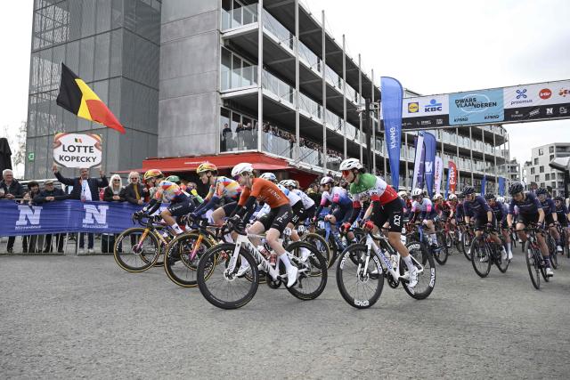 (From L) Belgium's Lotte Kopecky of SD Worx-Protime, Belgium's Mischa Bredewold of SD Worx-Protime, Netherlands' Puck Pieterse of Fenix-Premier Tech and Italy's Elisa Longo Borghini of UAE Team ADQ take the start of the women's elite race of the Dwars door Vlaanderen cycling event, 128,9km from Roeselare to Waregem, on April 1, 2026. (Photo by Tom Goyvaerts / Belga / AFP) / Belgium OUT