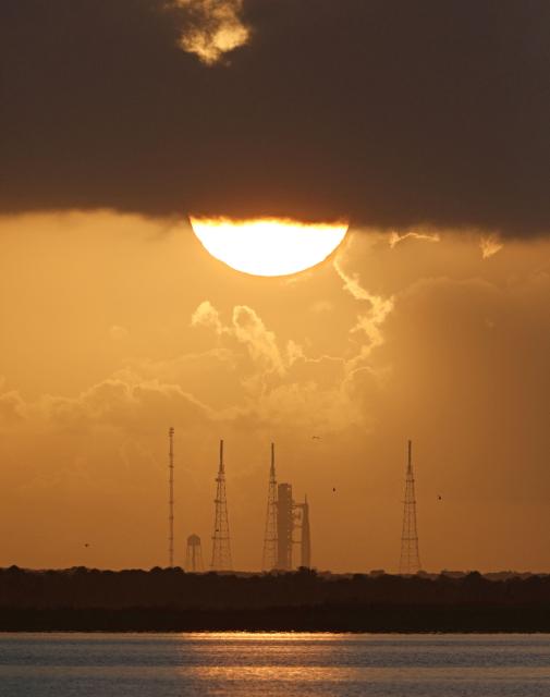 NASA's Artemis II Space Launch System (SLS) rocket is seen at sunrise at the Kennedy Space Center in Cape Canaveral, Florida on April 1, 2026. The first window to launch from the Kennedy Space Center in Florida opens Wednesday, April 1 at 6:24 pm (22:24 GMT), and NASA officials said the countdown began at 4:44 pm. (Photo by Gregg Newton / AFP)