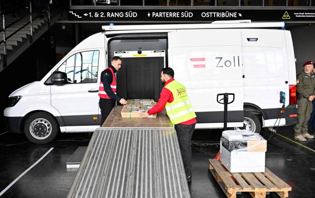 Customs personnel performs a security check using a scanner during the presentation of security preparations for the Eurovision Song Contest (ESC) at the Stadthalle in Vienna on April 1, 2026. The Austrian capital Vienna will host the Eurovision Song Contest 2026 from May 12 to 16, 2026. (Photo by HANS KLAUS TECHT / APA / AFP) / Austria OUT
