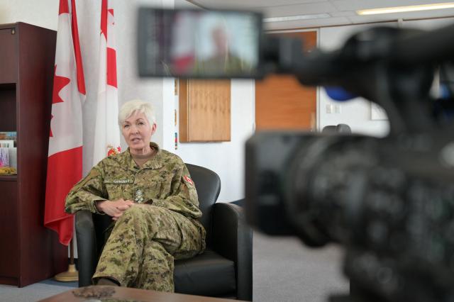 General Jennie Carignan, Chief of the Defence Staff of the Canadian Armed Forces, speaks during an interview in her office at the National Defence headquarters in Ottawa, on March 30, 2026. Canada's military is at a "turning point," says to AFP Canada's top general Jennie Carignan, as it gears towards "larger-scale conflicts" and prepares to defend the Arctic that "geography no longer protects as well as it did." (Photo by Daphné LEMELIN / AFP)