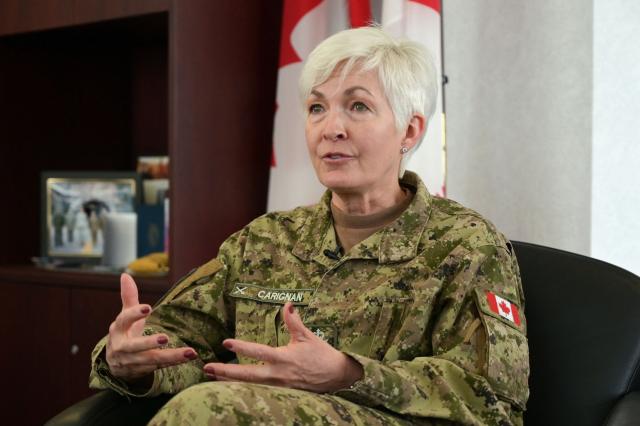 General Jennie Carignan, Chief of the Defence Staff of the Canadian Armed Forces, speaks during an interview in her office at the National Defence headquarters in Ottawa, on March 30, 2026. Canada's military is at a "turning point," says to AFP Canada's top general Jennie Carignan, as it gears towards "larger-scale conflicts" and prepares to defend the Arctic that "geography no longer protects as well as it did." (Photo by Daphné LEMELIN / AFP)