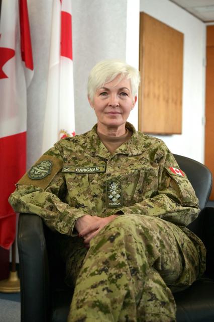 General Jennie Carignan, Chief of the Defence Staff of the Canadian Armed Forces, poses for a portrait in her office at the National Defence headquarters in Ottawa, on March 30, 2026. Canada's military is at a "turning point," says to AFP Canada's top general Jennie Carignan, as it gears towards "larger-scale conflicts" and prepares to defend the Arctic that "geography no longer protects as well as it did." (Photo by Daphné LEMELIN / AFP)