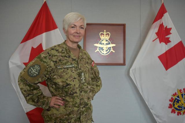 General Jennie Carignan, Chief of the Defence Staff of the Canadian Armed Forces, poses for a portrait in her office at the National Defence headquarters in Ottawa, on March 30, 2026. Canada's military is at a "turning point," says to AFP Canada's top general Jennie Carignan, as it gears towards "larger-scale conflicts" and prepares to defend the Arctic that "geography no longer protects as well as it did." (Photo by Daphné LEMELIN / AFP)