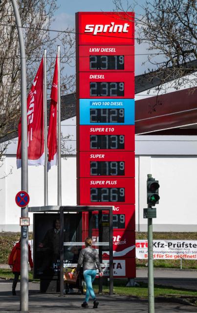 A digital display shows the price of petrol at a Star petrol station in Berlin on April 1, 2026. Oil and natural gas prices have surged since the end of February 2026, when the United States and Israel began attacking Iran, plunging the Middle East into turmoil. (Photo by John MACDOUGALL / AFP)