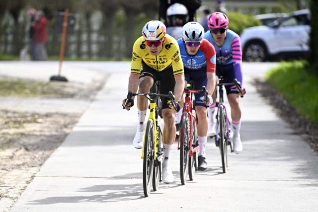 (From front to back) Visma Lease a Bike's Belgian rider Wout van Aert, Groupama-FDJ United's French rider Romain Gregoire and Unibet Rose Rockets's Danish rider Niklas Larsen compete during the men's elite race of the Dwars door Vlaanderen cycling event, 184.6km from Roeselare to Waregem on April 1, 2026. (Photo by JASPER JACOBS / BELGA / AFP) / Belgium OUT