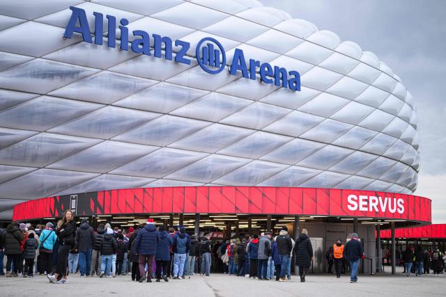 People arrive at the Allianz arena prior to the UEFA Women's Champions League, Quarter Final second-leg football match between FC Bayern Munich and Manchester United in Munich on April, 1 2026. (Photo by Markus FISCHER / AFP)