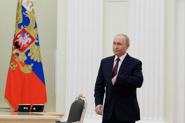 Russian President Vladimir Putin arrives for talks with Armenian Prime Minister at the Kremlin in Moscow, on April 1, 2026. (Photo by Pavel Bednyakov / POOL / AFP)